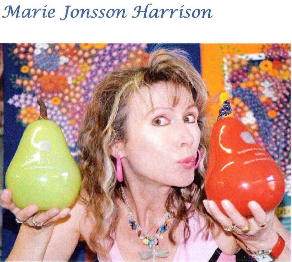 naive/outsider artist marie jonsson-harrison holding 2 of her South Australian Great Awards 2002 and 2007 awarded for the Arts category